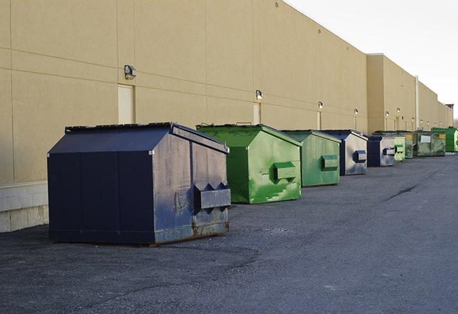 construction waste bins waiting to be picked up by a waste management company in Carlisle, OH